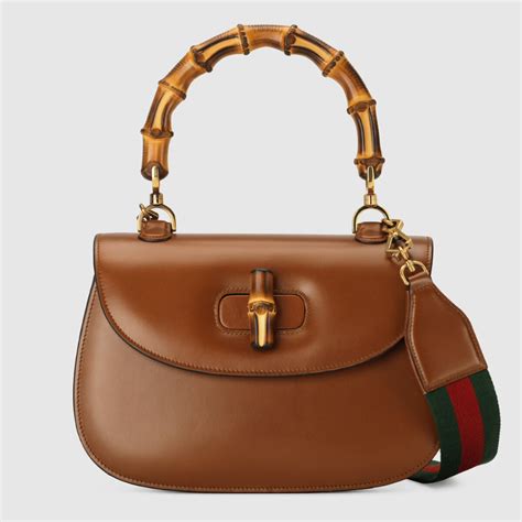 gucci suede bamboo handle bag|gucci bamboo bag 2022.